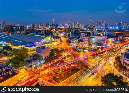BANGKOK, THAILAND-Dec 1, 2018: traffic at Hua Lamphong intersection and Hua Lamphong railway station at twilight in Bangkok, Thailand
