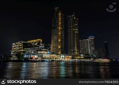 Bangkok, thailand - Feb 07, 2020 : Exterior view of the Icon Siam on the river Icon Siam is a new shopping center and a landmark in Bangkok at night. Selective focus.