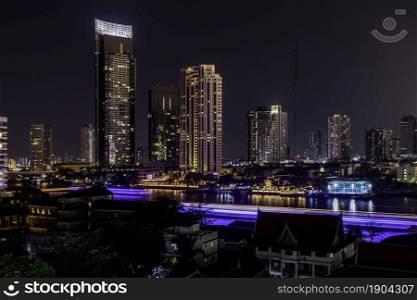 Bangkok, thailand - Feb 07, 2020 : Skyscrapers in the business district in Bangkok In the night. Bangkok night view give the city a modern style. Selective focus.