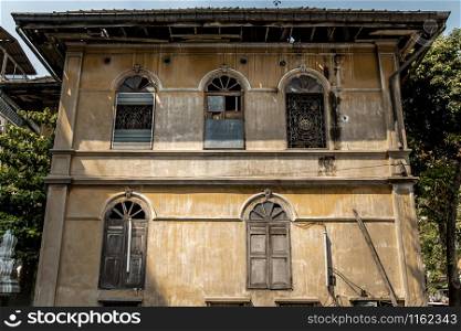 Bangkok, Thailand - Jan 09, 2019 : External of old building was left to deteriorate over time, Western Architecture style.