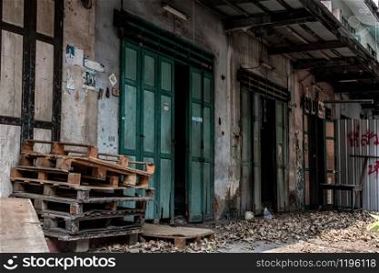 Bangkok, Thailand - Jan 19, 2020 : External of old house was left to deteriorate over time, Chinese Architecture style, Abandoned house, Destroyed house, Ruined house.