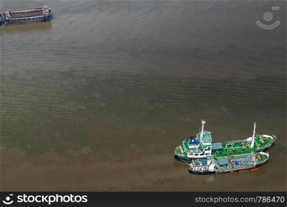 Bangkok, Thailand - Jul 05, 2019 : Many boats docked in the Chao Phraya River in the afternoon, Top view.