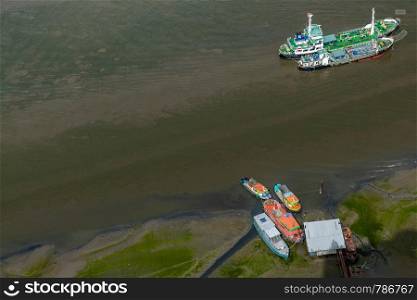Bangkok, Thailand - Jul 05, 2019 : Many boats docked in the Chao Phraya River in the afternoon, Top view.