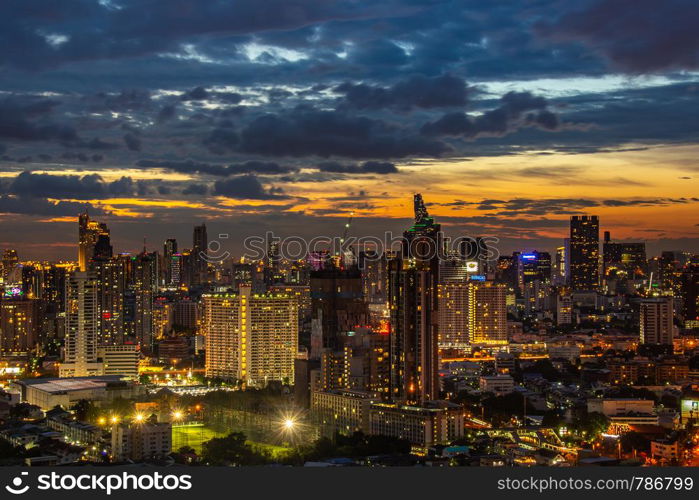 Bangkok, thailand - jul 06, 2019 : Sky view of Bangkok with skyscrapers in the business district in Bangkok in the during beautiful twilight give the city a modern style.