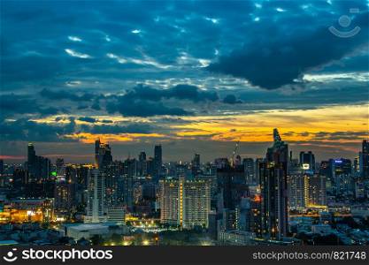 Bangkok, thailand - jul 06, 2019 : Sky view of Bangkok with skyscrapers in the business district in Bangkok in the during beautiful twilight give the city a modern style.