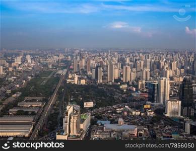 BANGKOK, THAILAND - NOVEMBER 09: Cityscape with the traffic on November 09, 2012, bird eye view from Baiyok Tower in Bangkok, Thailand
