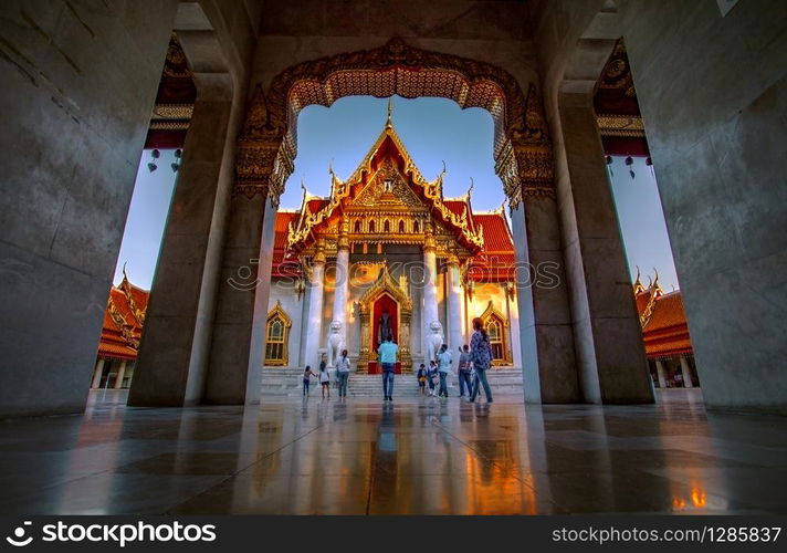 bangkok thailand - october27,2018 : group of tourist taking a photograph in front of marble temple church ,wat benchamabophit temple one of most popular traveling destination in heart of thailand capital city