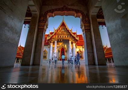 bangkok thailand - october27,2018 : group of tourist taking a photograph in front of marble temple church ,wat benchamabophit temple one of most popular traveling destination in heart of thailand capital city