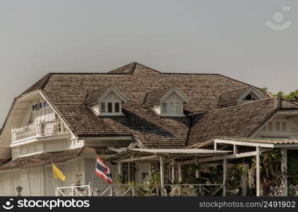 Bangkok,Thailnad - Apr 13, 2022 : Beautiful vintage white wooden balcony house. No focus, specifically.