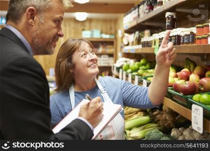 Bank Manager Meeting With Female Owner Of Farm Shop