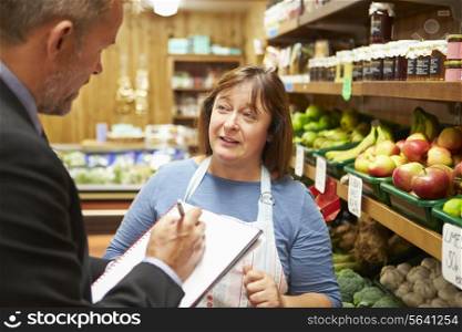Bank Manager Meeting With Female Owner Of Farm Shop
