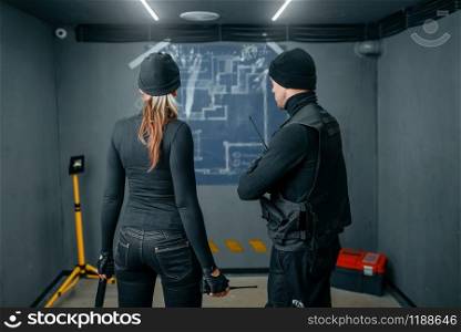Bank robbery of the century, two robbers working on a plan to rob the vault. Criminal profession, theft concept. Two robbers working on a plan to rob the vault