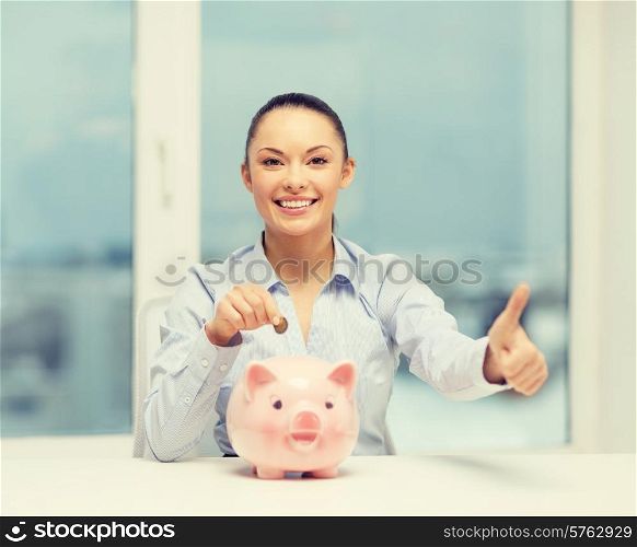 banking and finances concept - lovely woman with piggy bank and cash money showing thumbs up