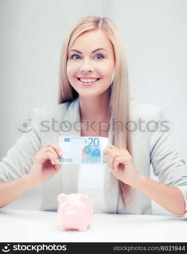 banking and finances concept - picture of lovely woman with piggy bank and cash money. woman with piggy bank and cash money