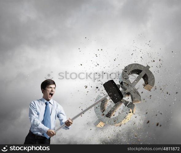 Banking concept. Young businessman crashing with hammer stone dollar symbol