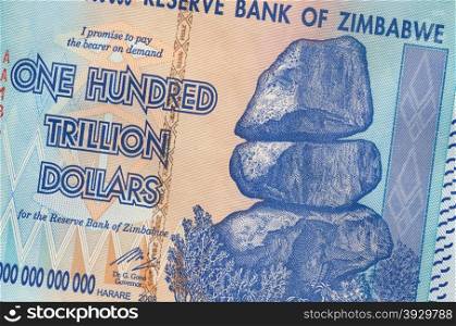 Banknote of Zimbabwe of one hundred trillion dollars. This banknote has the highest nominal value in history.