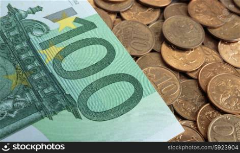 Banknotes of one hundred euros on coins