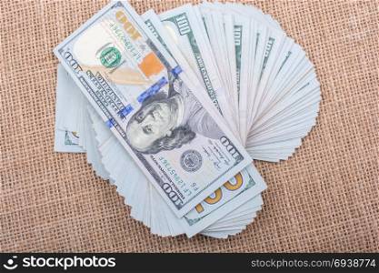Banknotes of US dollars on canvas on a linen canvas