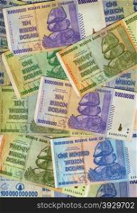 Banknotes of Zimbabwe including a banknote of one hundred trillion dollars. This banknote has the highest nominal value in history