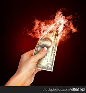 Banknotes open arms fire on a black background