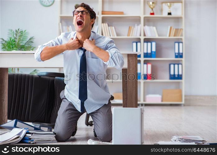 Bankrupt businessman angry in the office floor