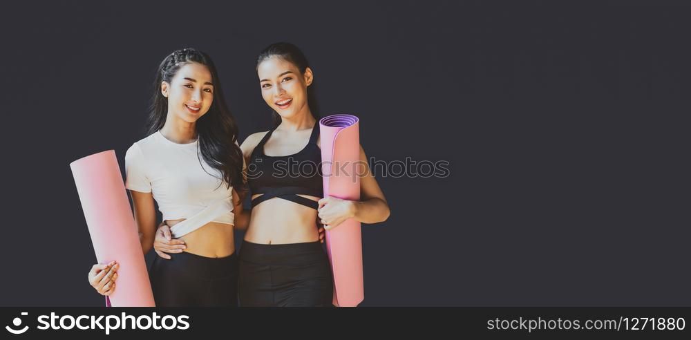 Banner and cover of Portrait Couple sporty asian woman standing and smiling, wearing sportswear bra and pants fashion, posture position, sport club community, sports and healthcare concept