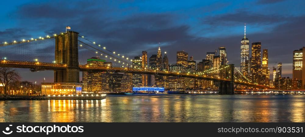 Banner and cover scene of New york Cityscape with Brooklyn Bridge over the east river at the twilight time, USA downtown skyline, Architecture and transportation concept