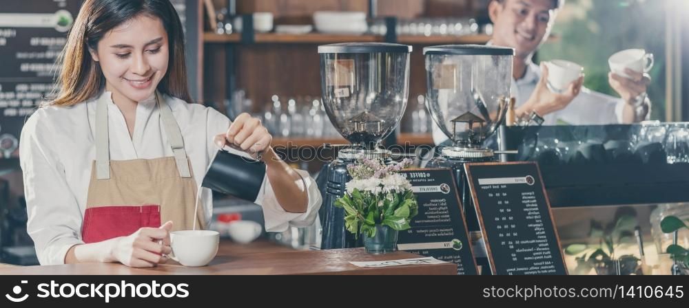 Banner of Asian Barista preparing cup of coffee, espresso with latte or cappuccino for customer order in coffee shop,bartender pouring milk,Small business owner and startup in coffee shop concept