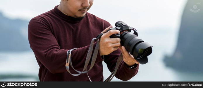 Banner of Portrait of photographer or the tourist over the Fantastic Landscape of samed nang chee view point at the sunrise time, Travel and holiday concept