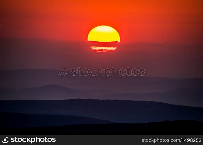 banner of sunrise or sunset over misty hills