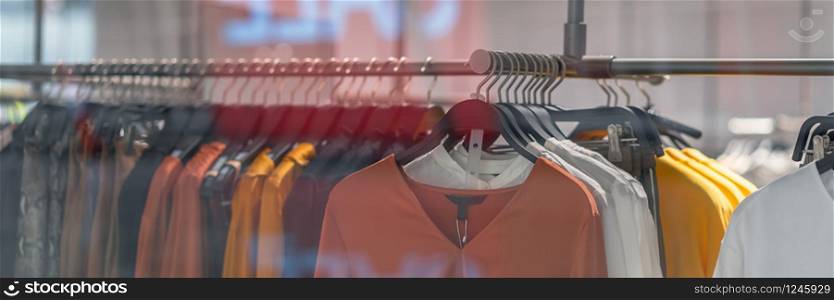 Banner, web page or cover template of clothes rack in glasses fashion shop at shopping department store for display, copy space and paranomic ratio, business fashion and advertisement concept