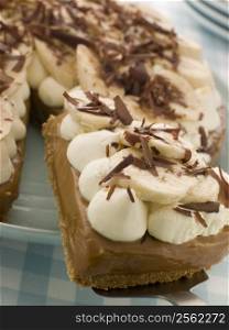 Banoffee Pie With A Slice Being Taken