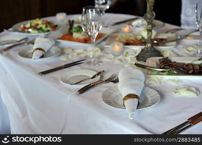 Banquet table setting for wedding dinner