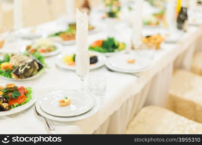 Banquet wedding table setting on evening reception