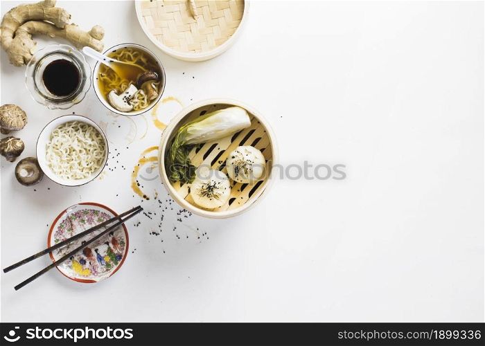 baozi near noodles soup. Resolution and high quality beautiful photo. baozi near noodles soup. High quality beautiful photo concept