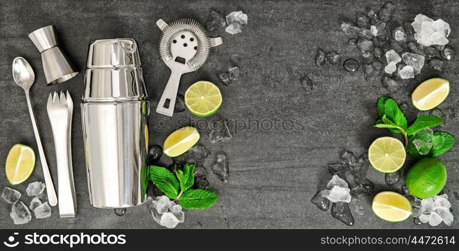 Bar accessories and ingredients for cocktail drink lime, mint, ice. Alcoholic and nonalcoholic cold drinks