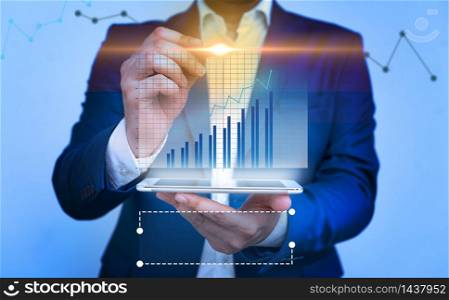 bar char improvement line smartphone computer office technology device. Bar chart growing up improvement line and man pointing to screen. Businessman and graph representation of increasing report. Office business concept and technological devices.