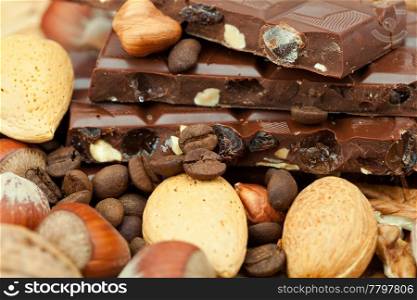 bar of chocolate and nuts on a wicker mat