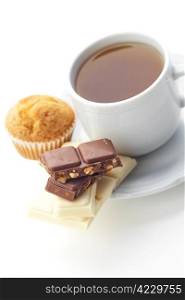 bar of chocolate,tea and muffin isolated on white