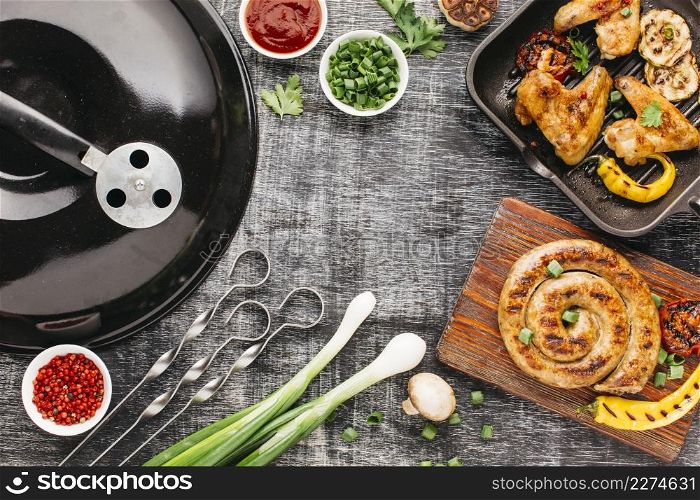 barbecue appliance grilled meat wooden background