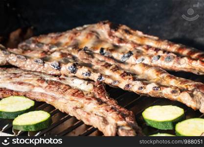 Barbecue grill with grilled pork ribs. Spanish churrasco
