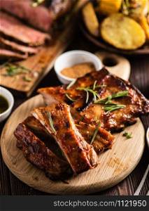 Barbecue pork rib with spices and baked potatoes