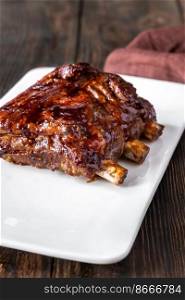 Barbecue pork spare ribs on the white plate