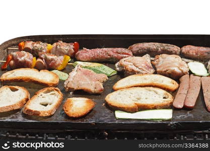 barbecue with meat, sausage, breaf and vegetables isolated