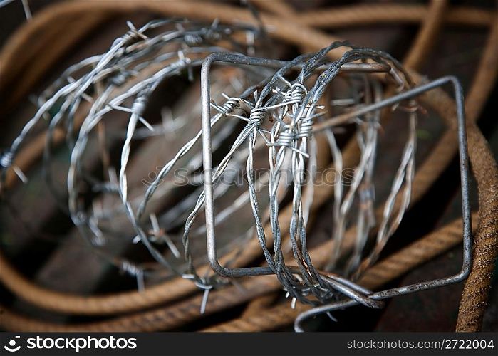 Barbed wire and rope
