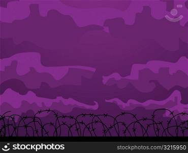 Barbed wire fence at dusk