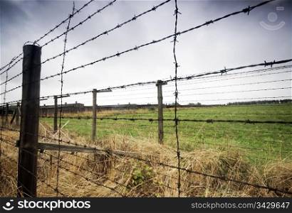 Barbed wire fence. Old prison