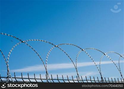barbed wire fence used for protection purposes of a pproperty