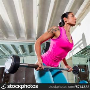 Barbell bent over row supine grip woman workout at gym exercise