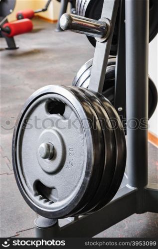 Barbell plates holder rack in the gym